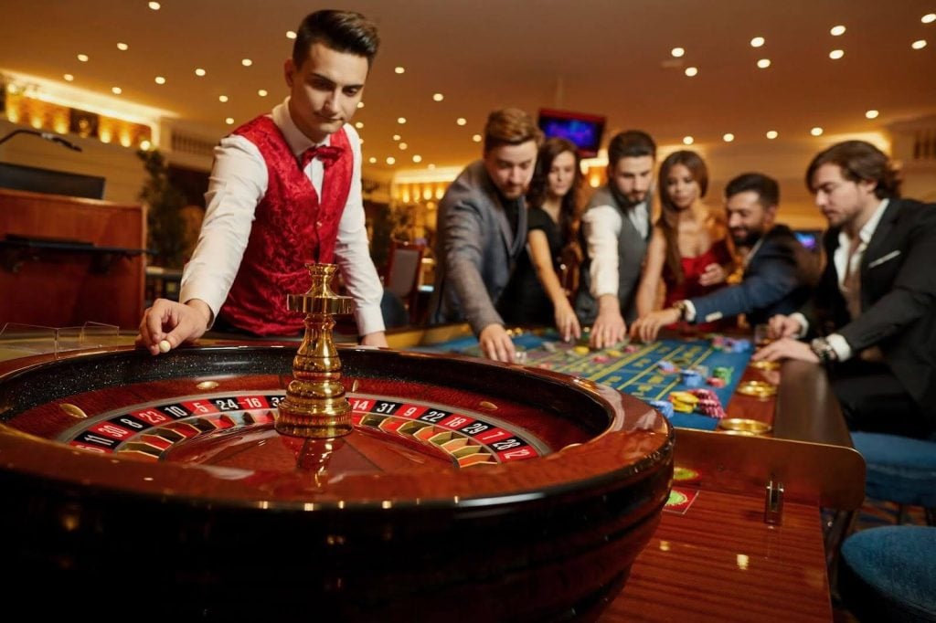 People playing roulette in a casino